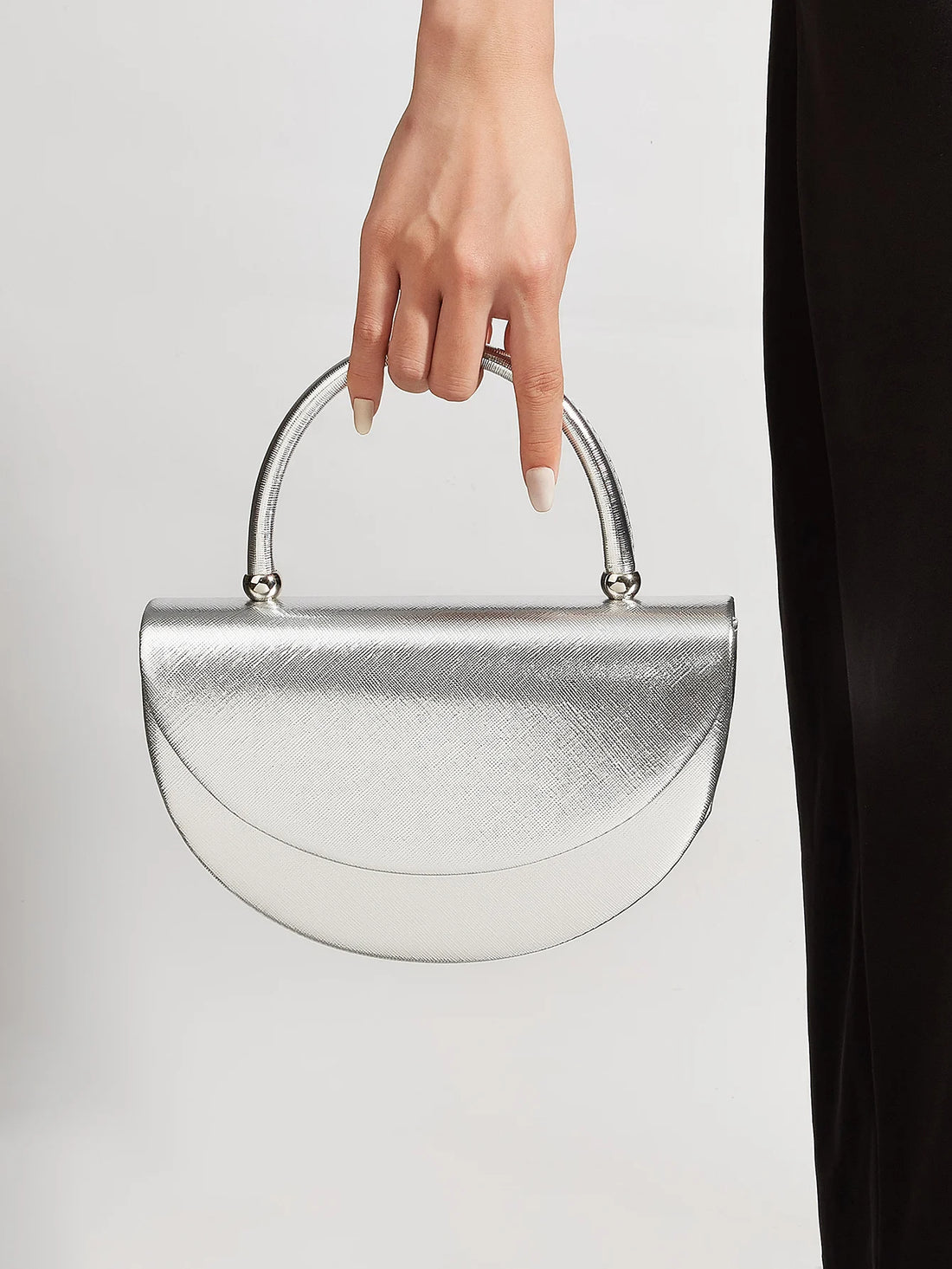 Beautiful and shiny pleated clutches and evening bags, bridal wedding