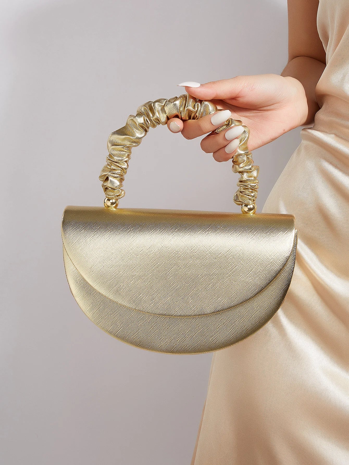 Beautiful and shiny pleated clutches and evening bags, bridal wedding