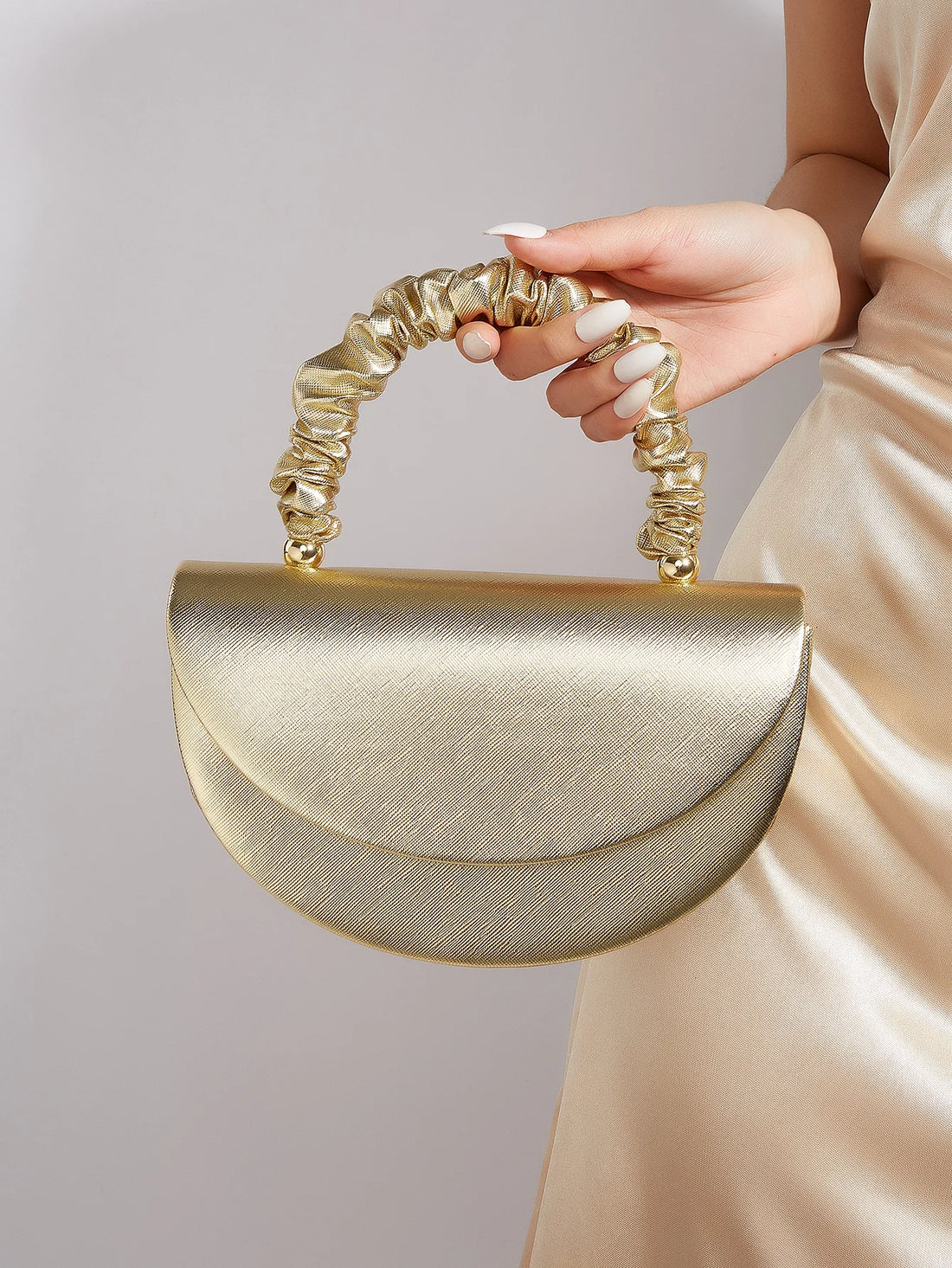Beautiful and shiny pleated clutches and evening bags, bridal wedding
