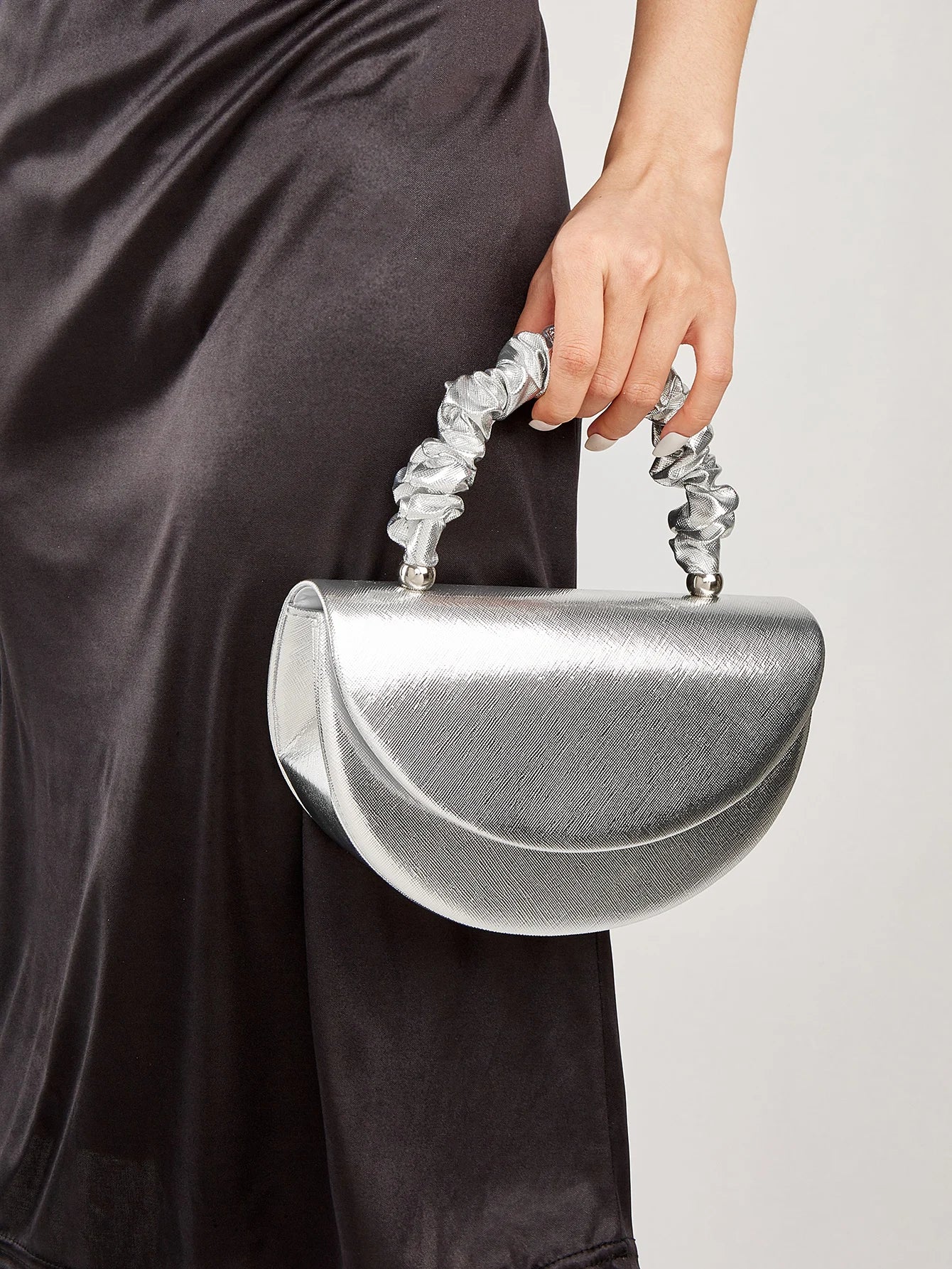 Beautiful and shiny pleated clutches and evening bags, bridal wedding